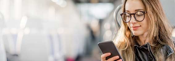Blonde woman browsing phone