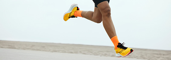 Image of legs running mid-stride