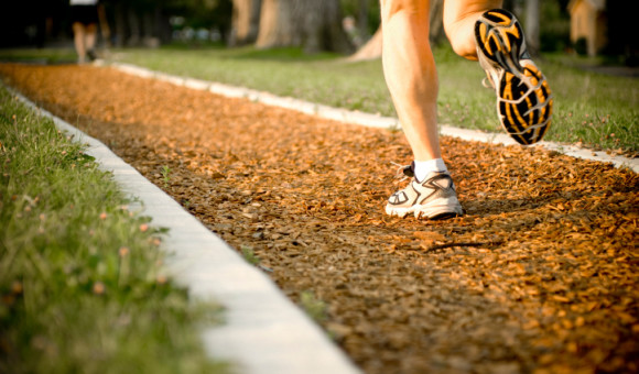 Person running on a trail