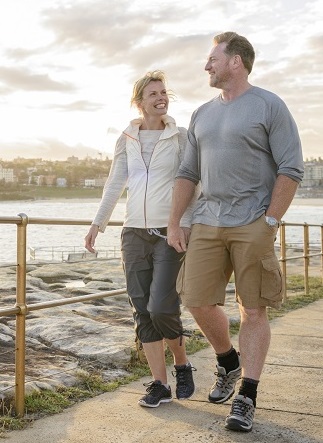 Couple walking near water